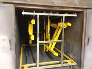 pulverbeschichtung_von_schweissbauteilen_20170101_1193477221 Gelbe Pulverbeschichtung von Schweissbauteilen